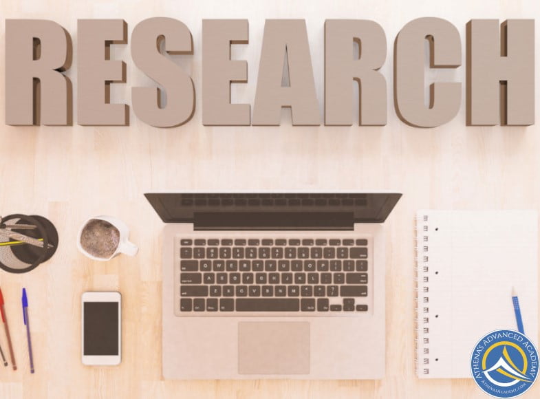 A work station with the word "Research" above it - A Basic Introduction to Research Design